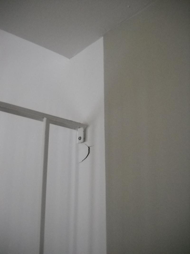 The rail wasn't attached to the wall....there was 2 kids in house .wasn't stayin